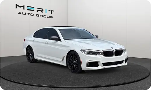 BMW sedan on a studio turntable