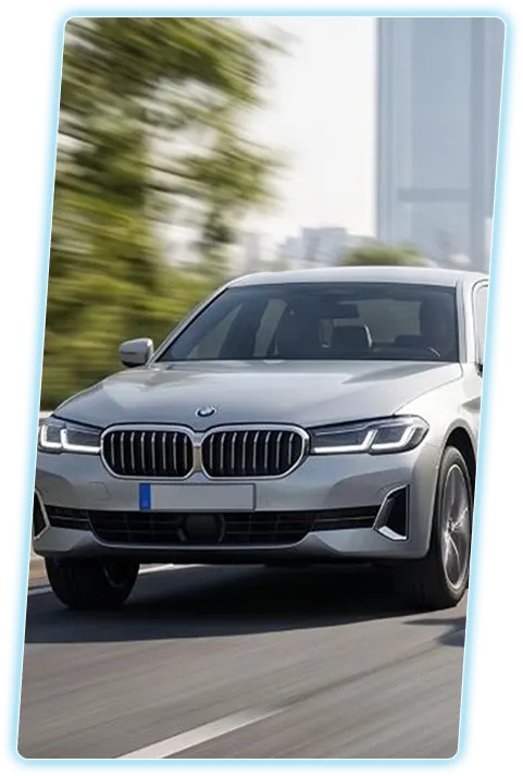 BMW sedan front view against a city skyline