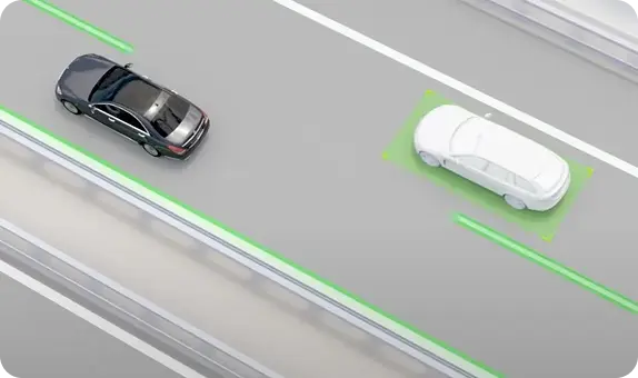 Top-down illustration of automated lane-change assist highlighting an adjacent lane