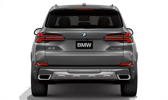 Rear view of a gray BMW X5 showing the power tailgate and taillights