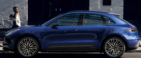 Blue Porsche Macan side profile