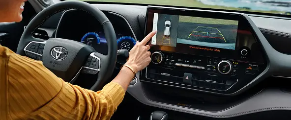 Toyota Highlander interior with steering wheel and touchscreen