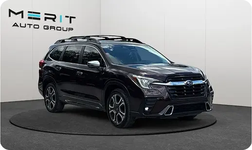 Dark Subaru SUV on a studio turntable