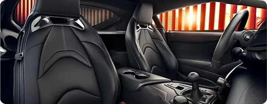 Toyota GR Supra interior with red-accented sport seats and center console