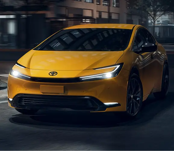 Yellow Toyota Prius Prime, front three-quarter view