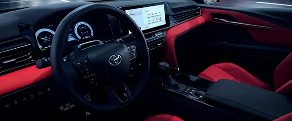 Toyota Camry cabin with red interior accents