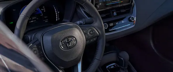 Toyota Corolla steering wheel and dashboard detail