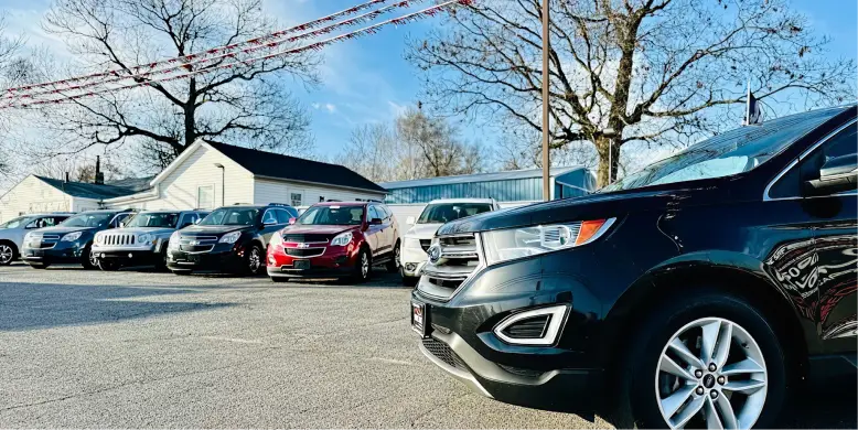Vehicles displayed outside Northwest Indiana Auto Outlet dealership.