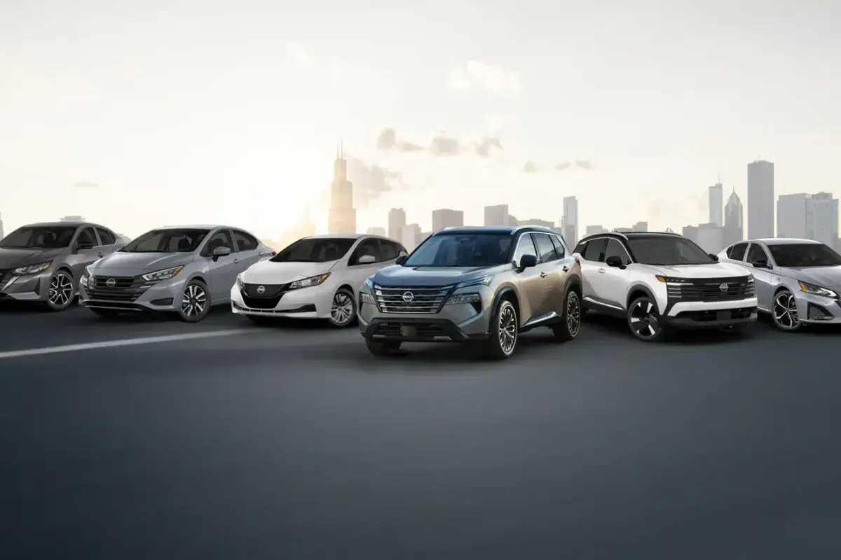 Nissan vehicles lined up against a city backdrop