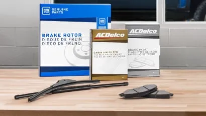 Various ACDelco parts and branded parts boxes.