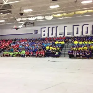 Local Harrison County Softball and Baseball Teams Get Recognized and Team Pictures Taken as Pettijohn Auto Center Employees Cook and Serve 400 Hot Dogs
