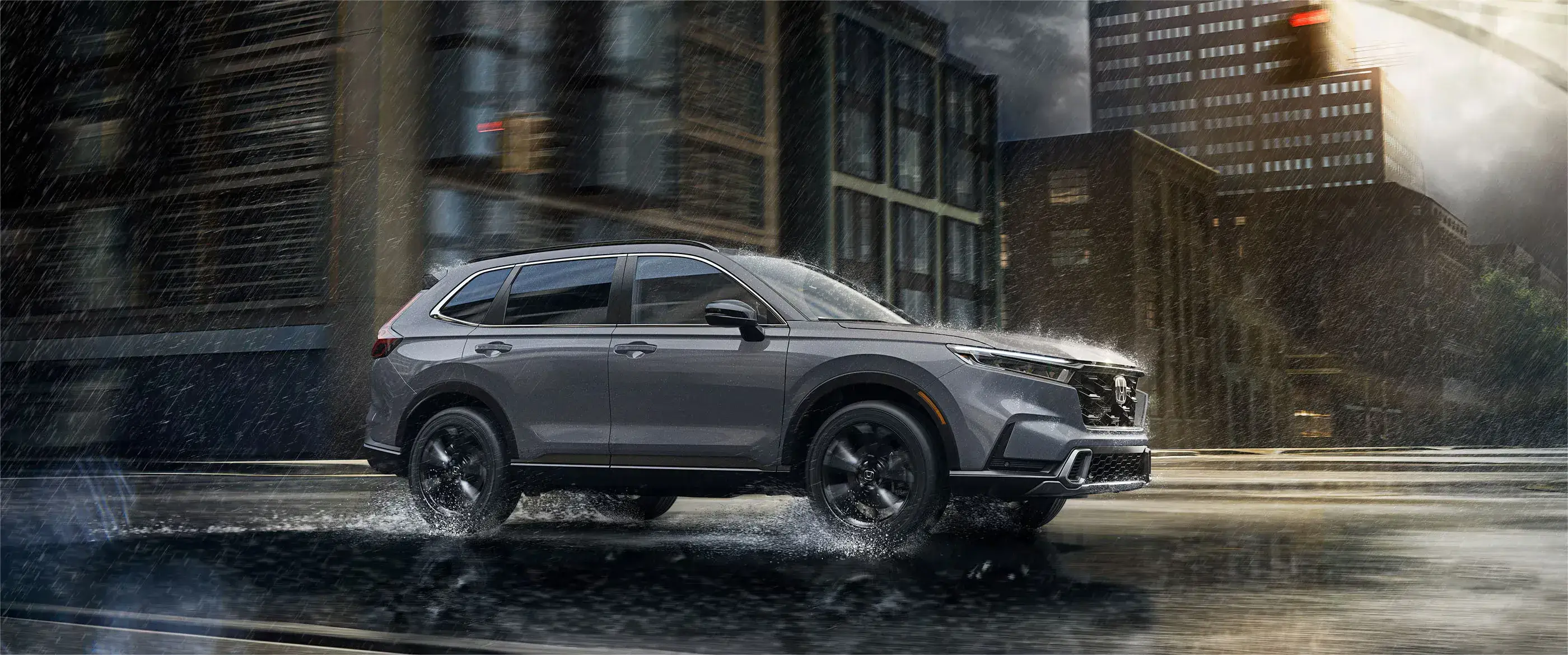 2027 Honda CR-V Hybrid parked on a city street, front three-quarter view