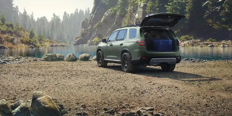 2027 Honda Pilot shown from the rear three-quarter angle with tailgate and rear lighting