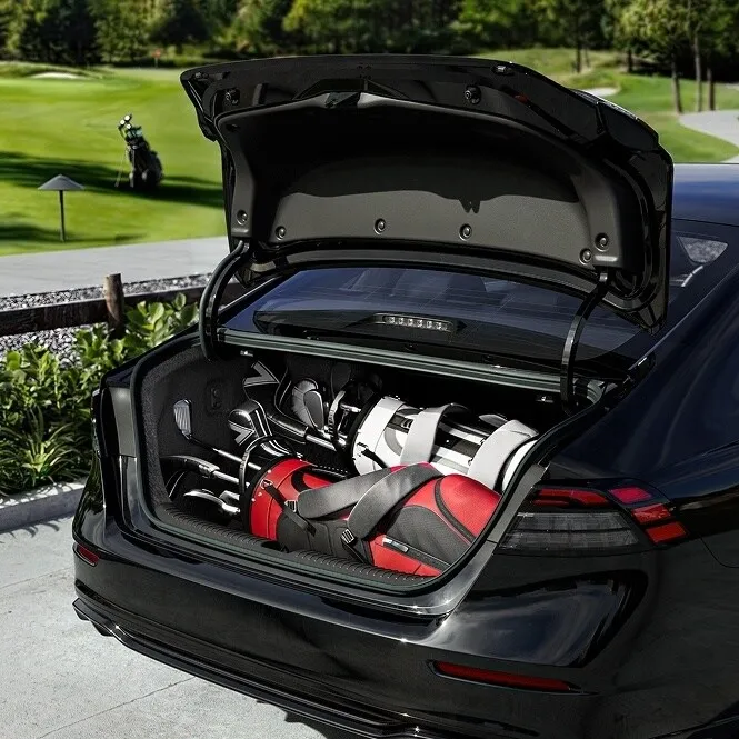 Honda Accord trunk open with bags and gear loaded inside