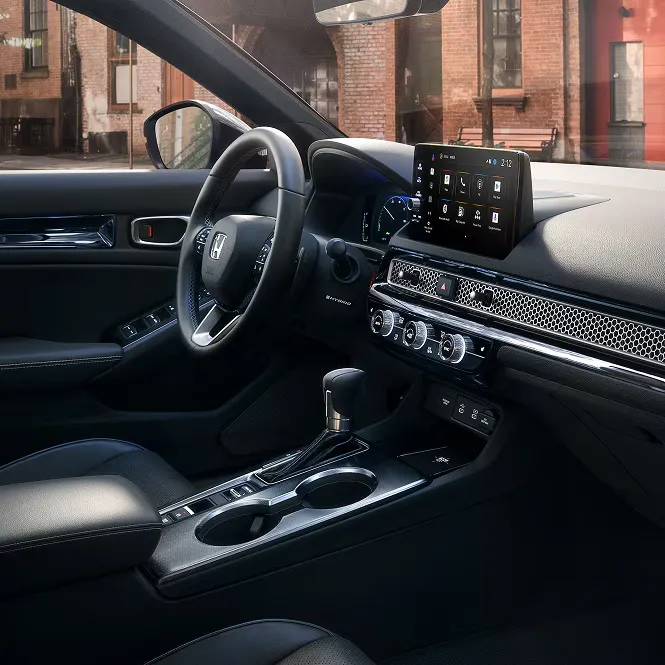 Honda Civic dashboard with touchscreen, honeycomb vent trim and center console