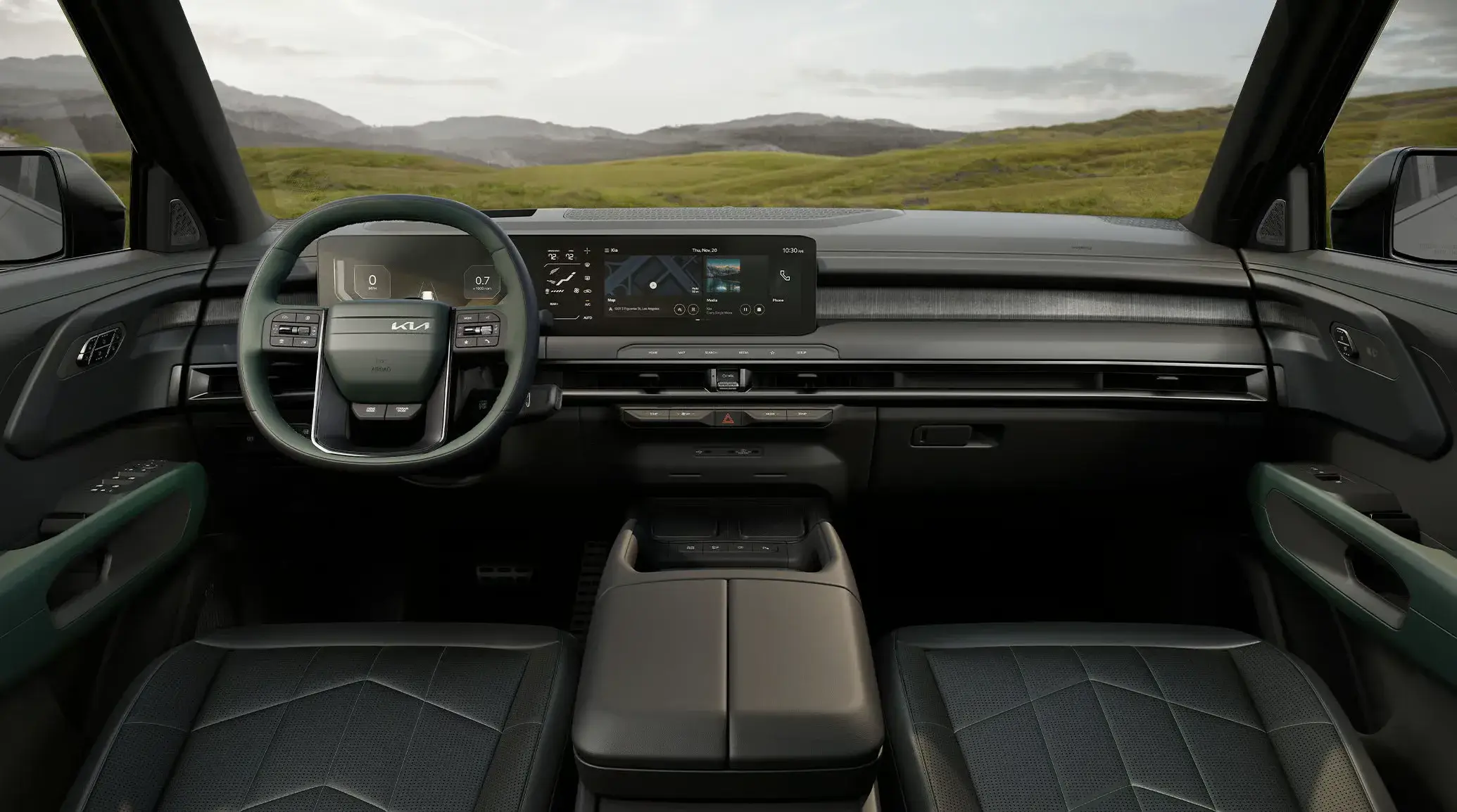 Front cabin of the 2027 Kia Telluride Hybrid with dual curved 12.3-inch displays across the dashboard