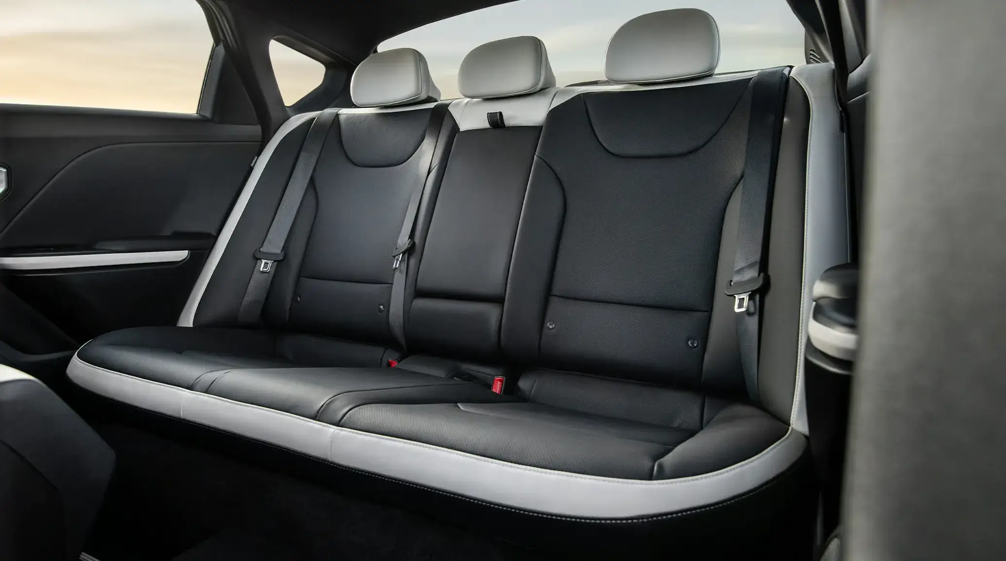 Rear seats of the 2027 Kia K4 showing its class-leading second-row legroom
