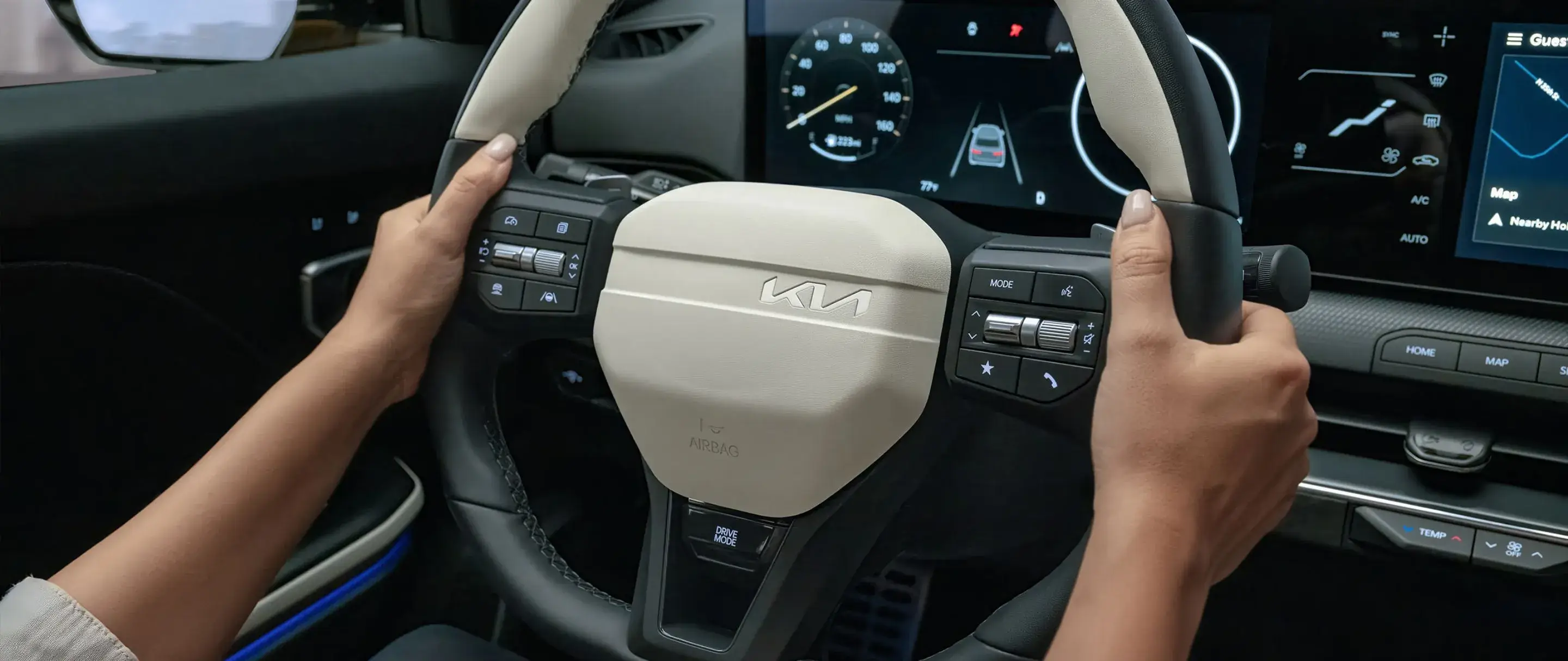 Sport steering wheel and driver controls in the 2027 Kia K4 hatchback GT-Line