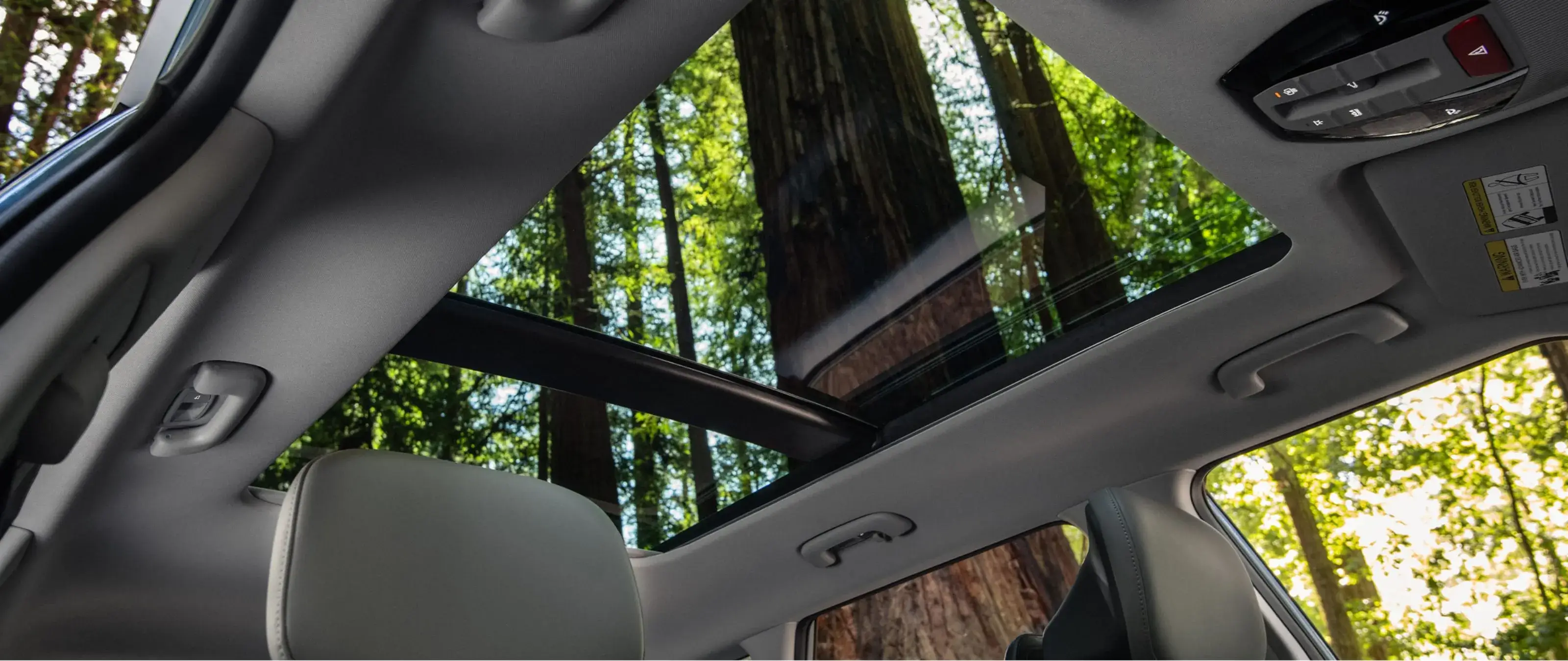 Panoramic sunroof in the 2027 Kia Seltos viewed from inside the cabin
