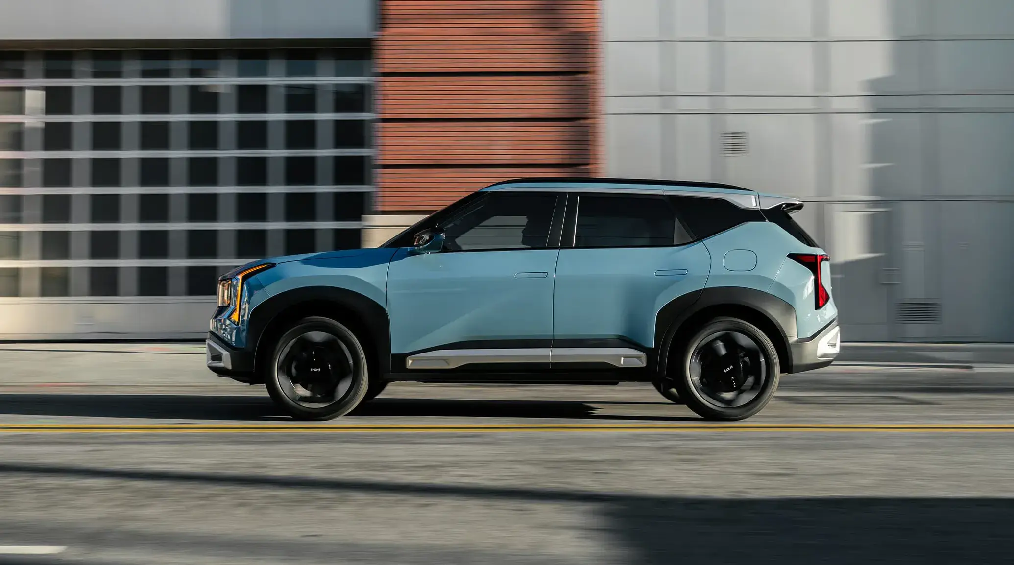 2027 Kia Seltos driver side profile showing the upright boxy proportions and flush door handles