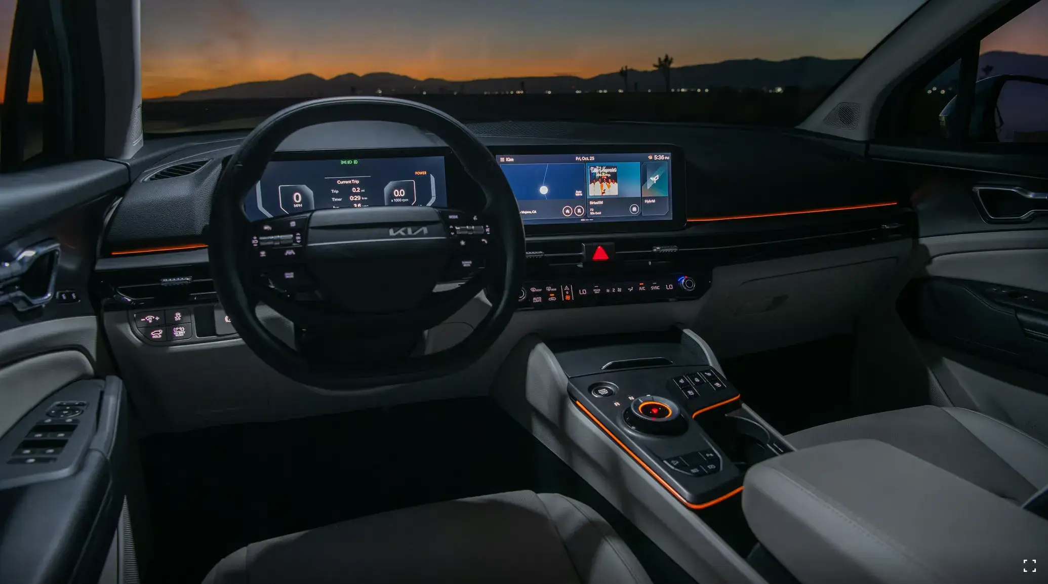 Interior of the 2027 Kia Sportage Hybrid showing the dashboard layout, center console and gear selector