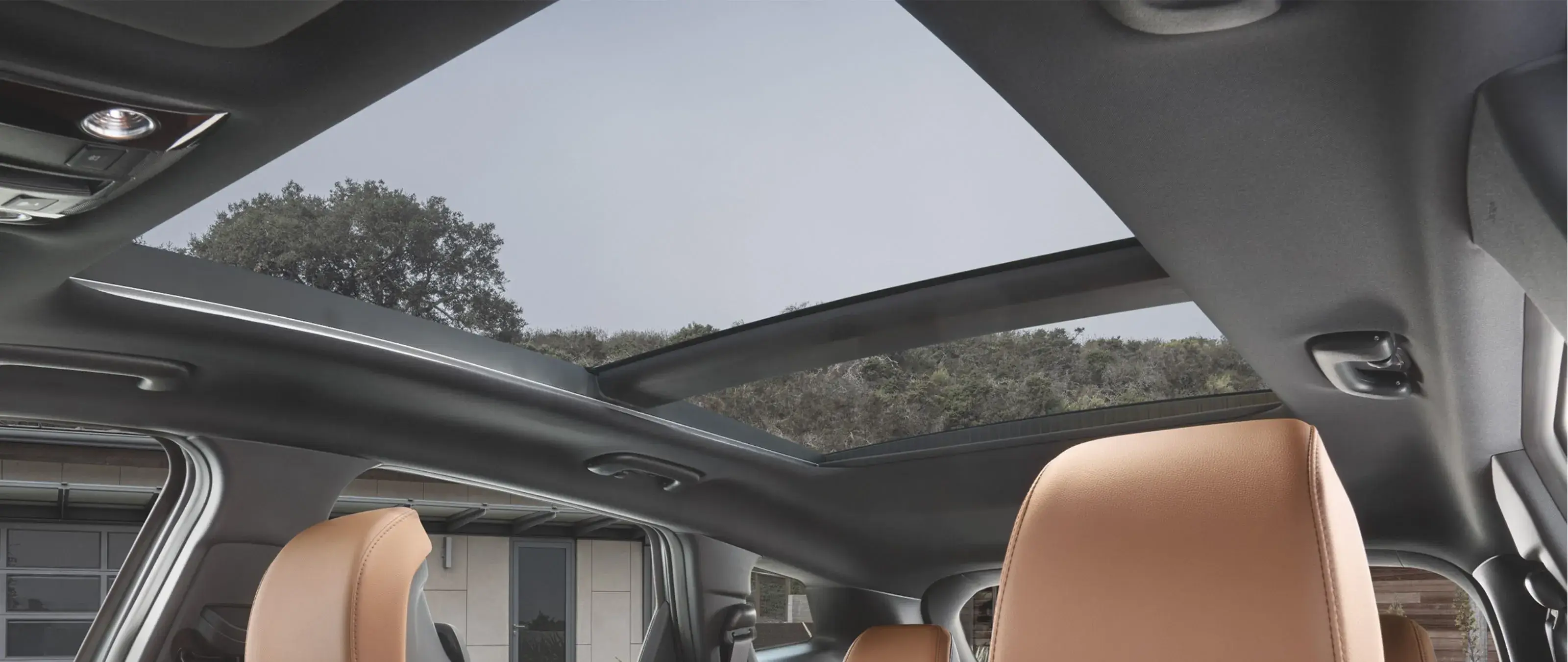 Panoramic sunroof in the 2027 Kia Sportage Hybrid viewed from inside the cabin