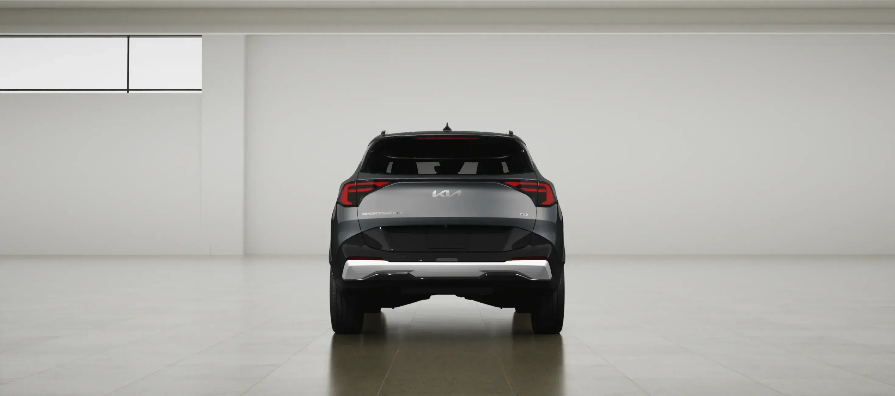 Rear view of the 2027 Kia Sportage Hybrid showing the wide tailgate opening and connected taillight signature