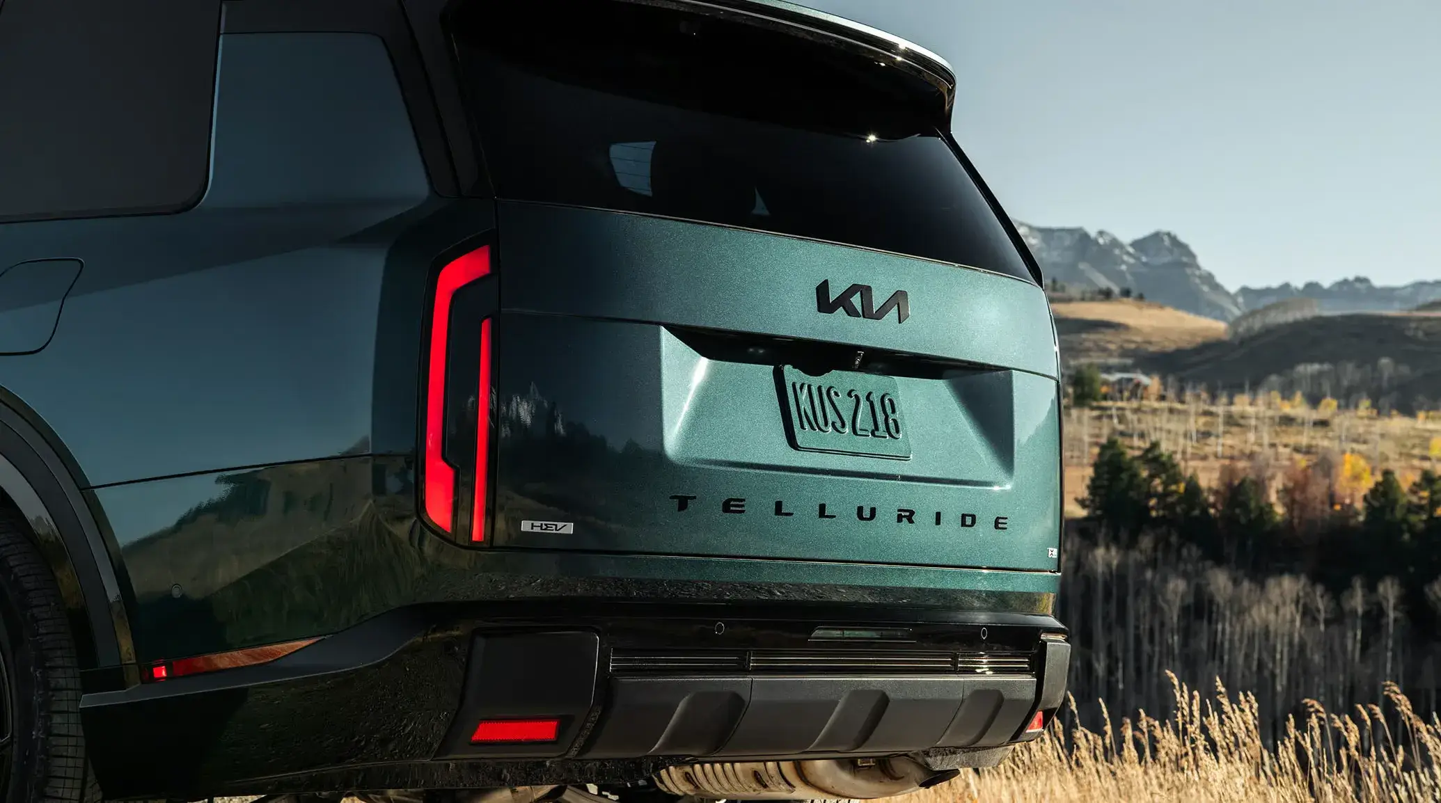 Rear view of the 2027 Kia Telluride Hybrid showing the full-width vertical taillights and upright tailgate