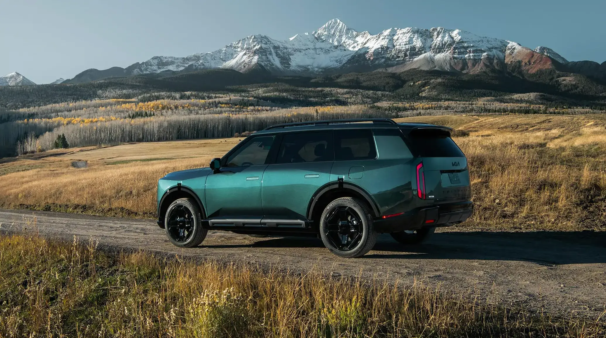 2027 Kia Telluride Hybrid in profile from the driver side showing the boxy second-generation body and long wheelbase
