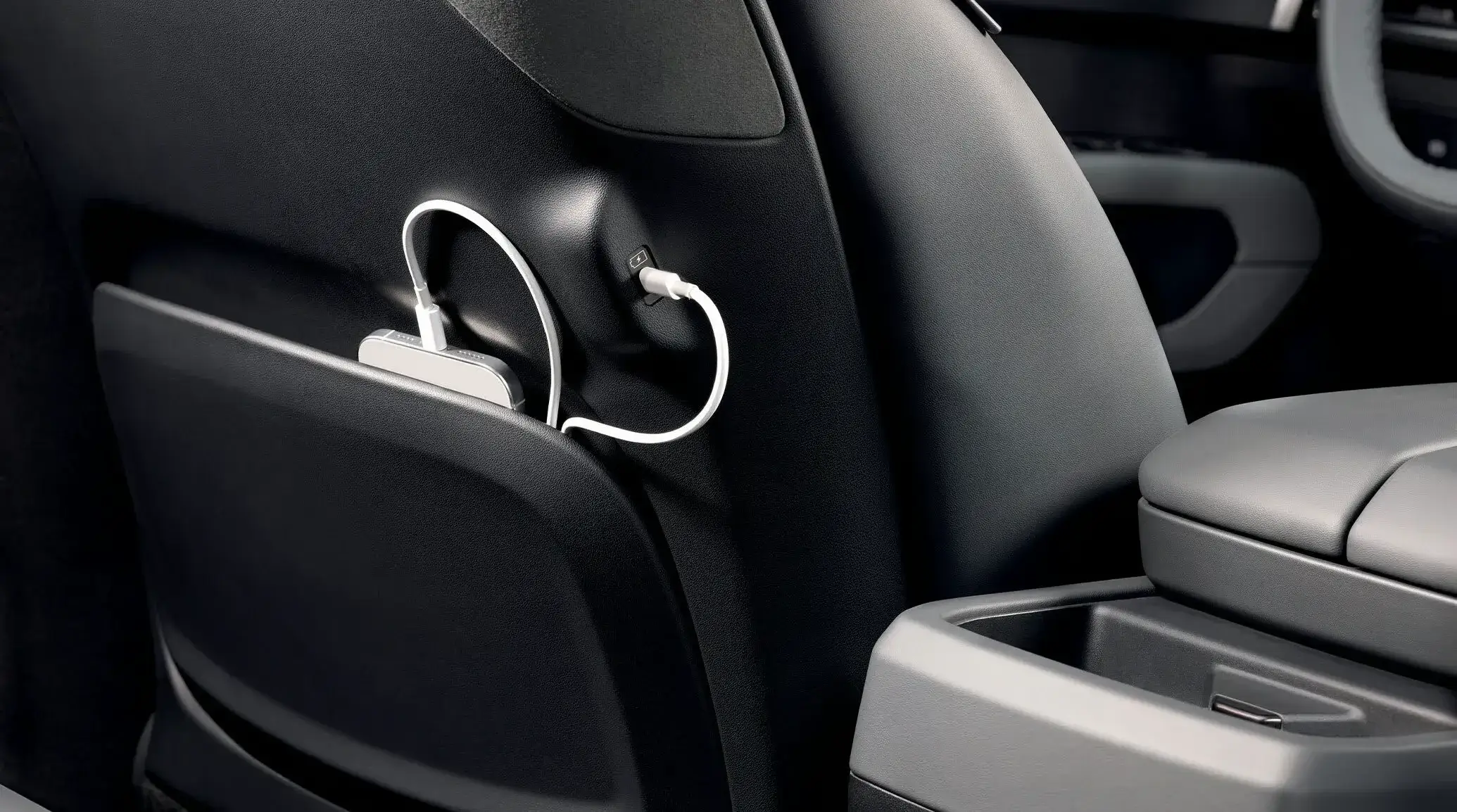 USB-C fast charging port integrated into the driver seatback of the 2027 Kia Telluride Hybrid for second-row passengers