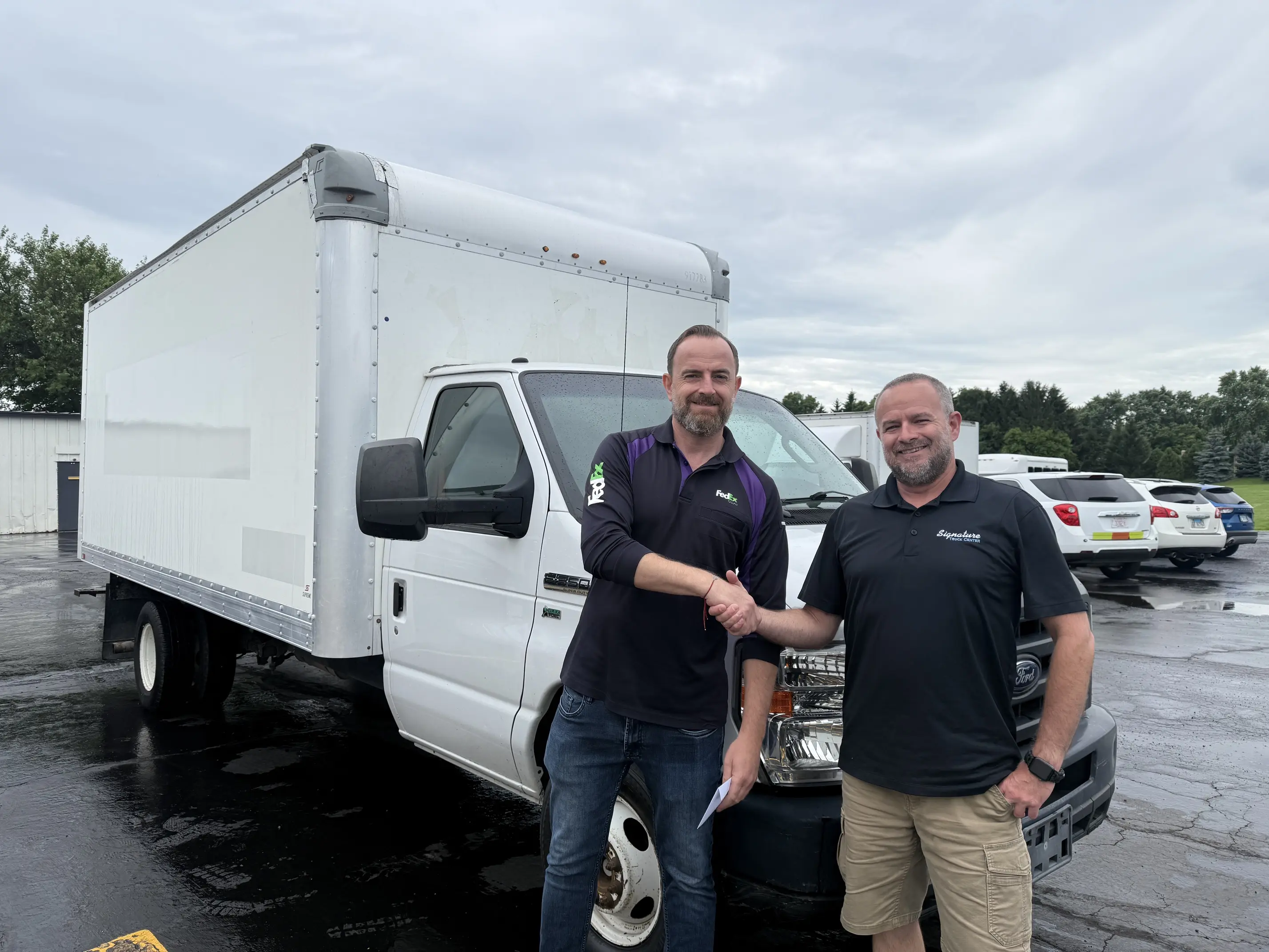 FedEx contractor Ivan taking delivery of a 16ft box truck for his route delivery FeEx operation
