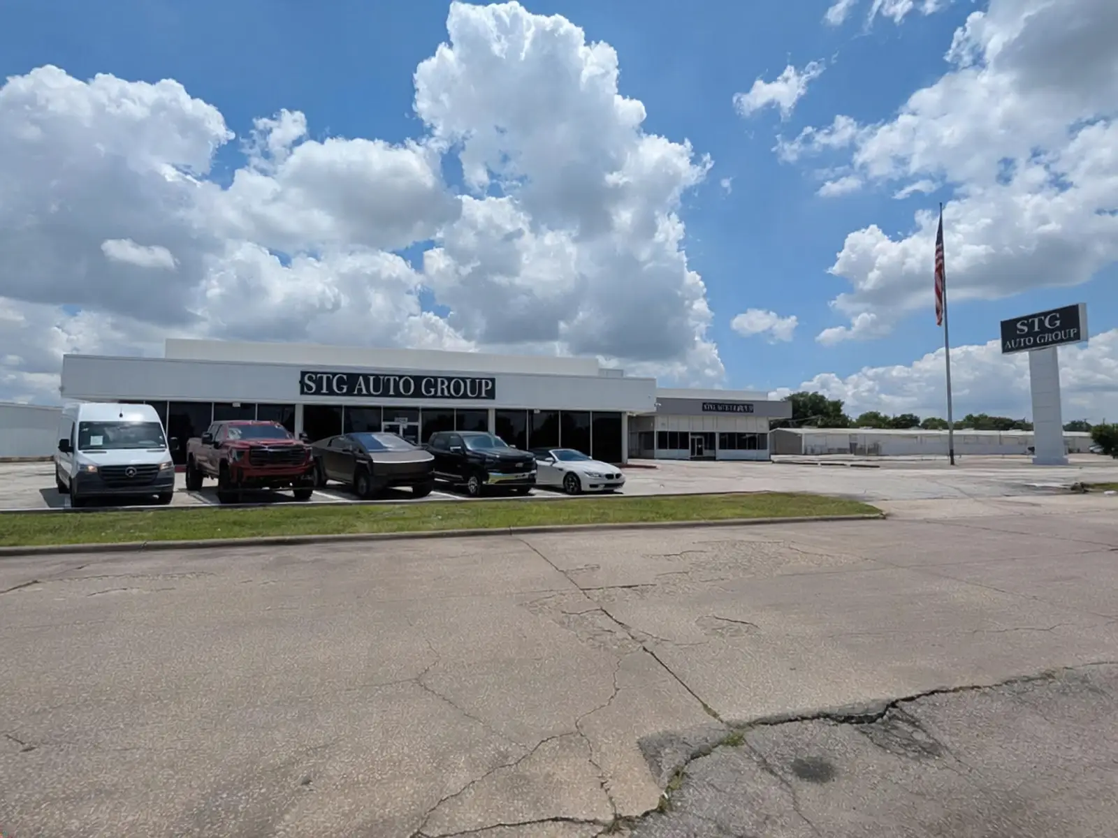 Pre-owned vehicles on the lot at STG Auto Group of Dallas