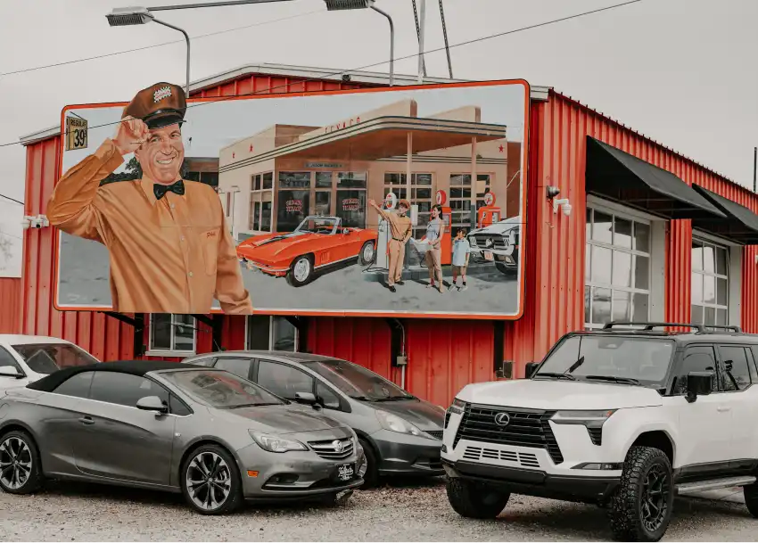 Tailgate Motor Co. exterior with used vehicles parked outside the dealership