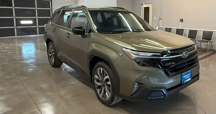 An Autumn Green Metallic 2025 Subaru Forester inside, awaiting its temporary drive, at Twin Falls Cars Sales and Rentals. Rental Cars in Twin Falls - drive what you reserved.