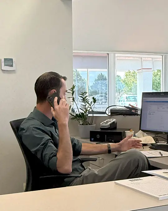 Sales & Finance Manager Thomas Carroll works the phones to get the best approval for our guests at Twin Falls Cars Sales and Rentals, in Twin Falls Idaho.