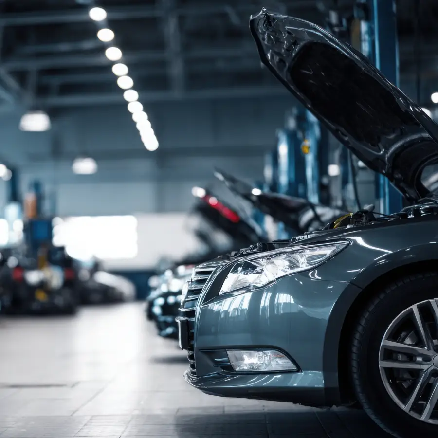 Vehicles lined up inside the Ultimate Autos service center in Mesa, AZ