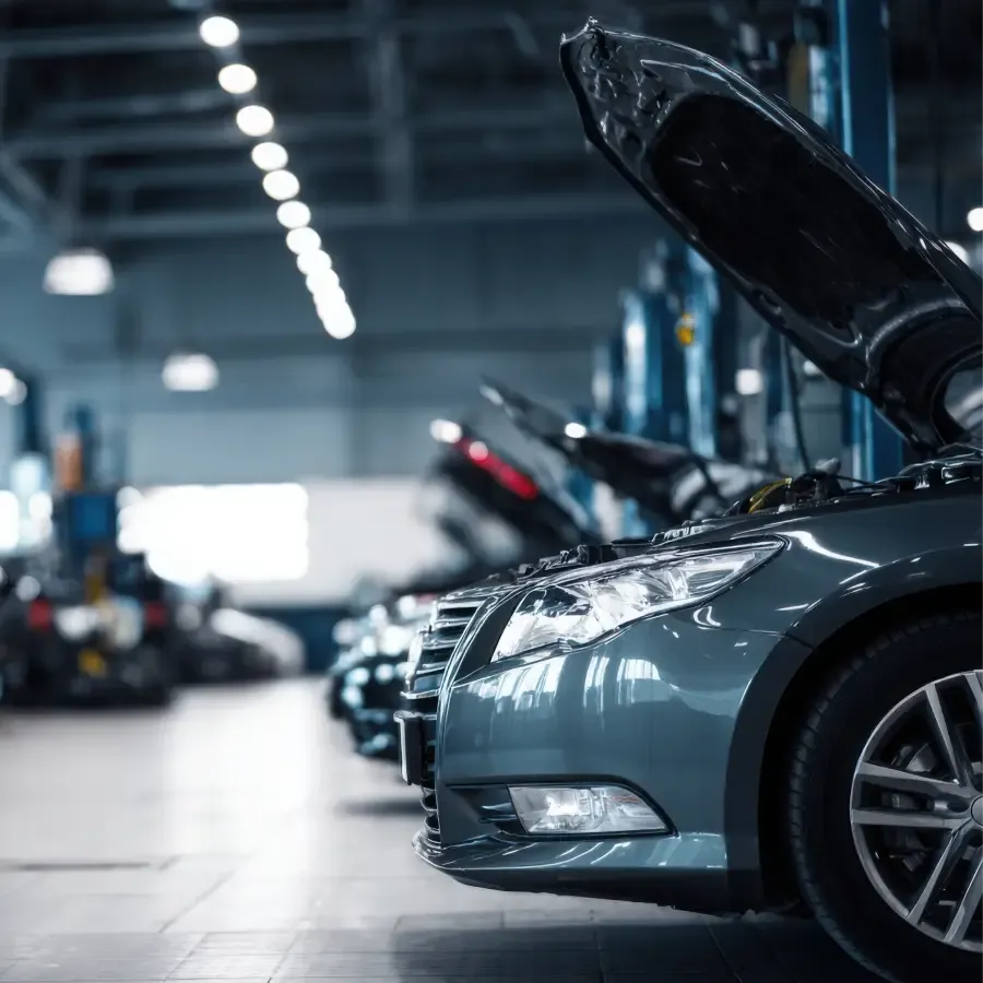 Vehicles lined up inside the Ultimate Powersports service center.