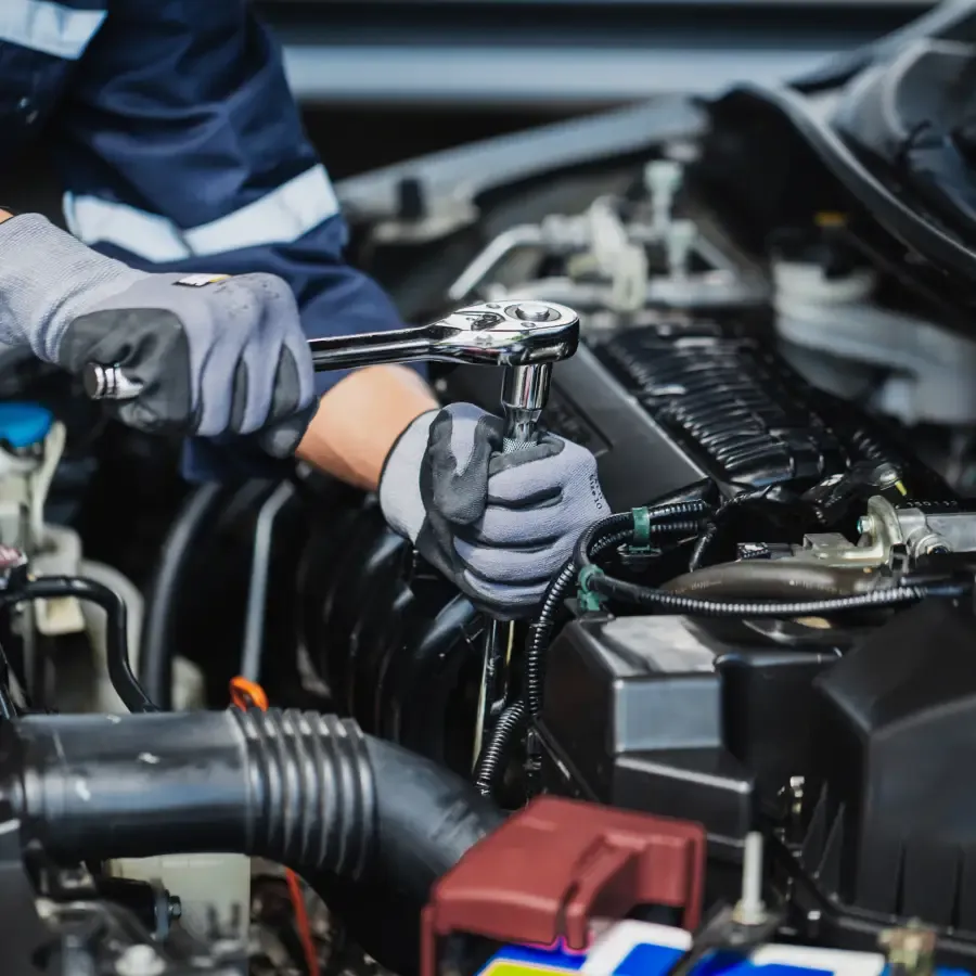 Technician performing transmission service in in Scottsdale, AZ.