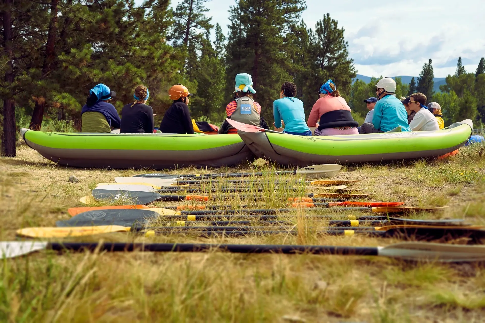 Campers Sitting in a Raft