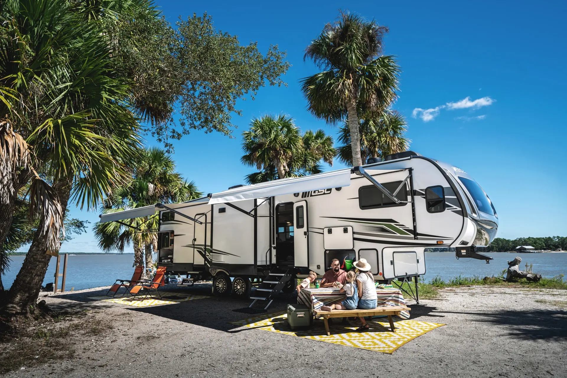 Family Camping in Front of Water