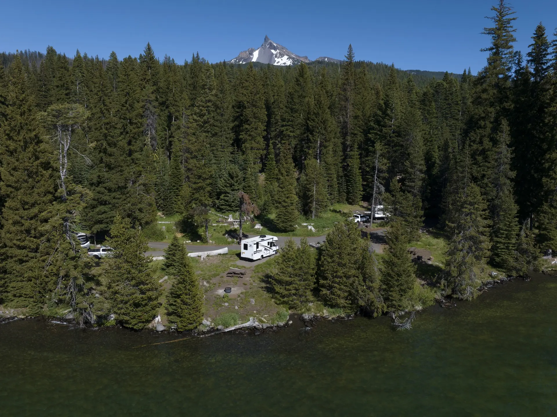 Overhead Shot of Jayco Camper With Mountain Top in Background