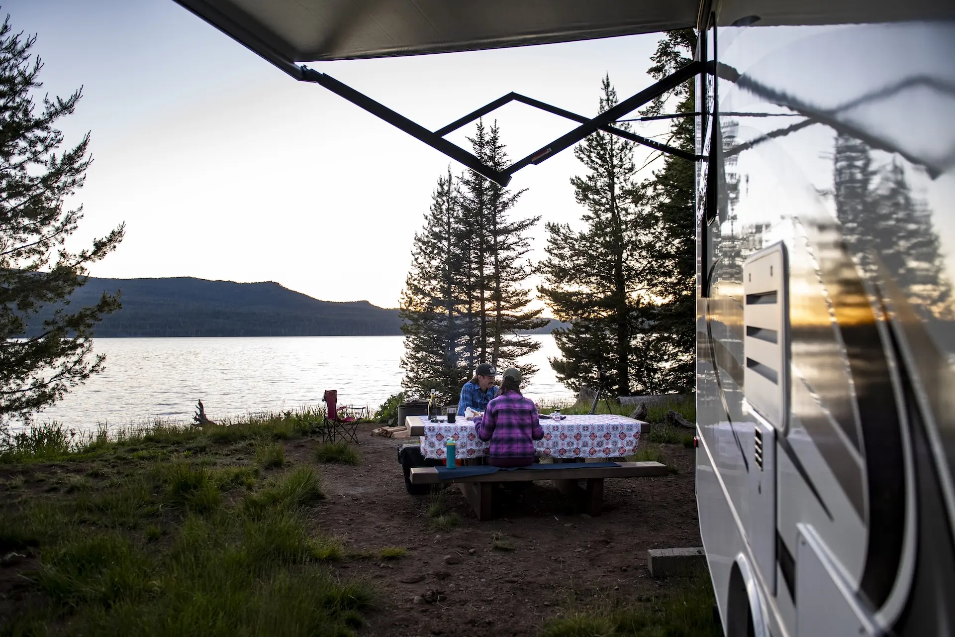 Having a Meal Lakeside Next to Jayco Camper