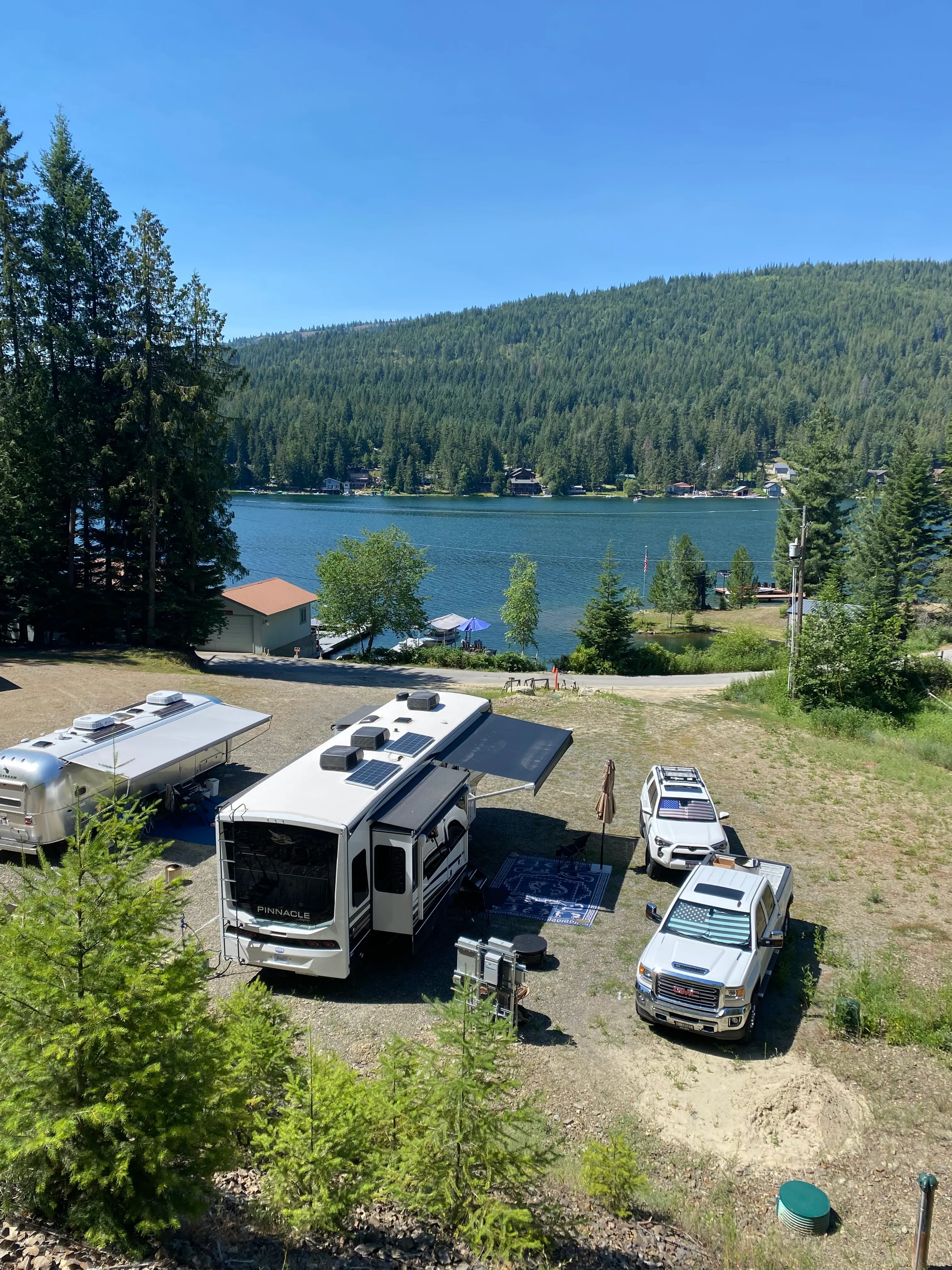 Camper Set up Next to the Lake