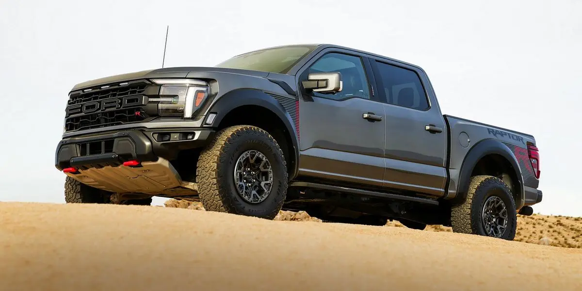 Ford F-150 Raptor R in Carbonized Gray Metallic parked in the desert, showing the R badge on the grille