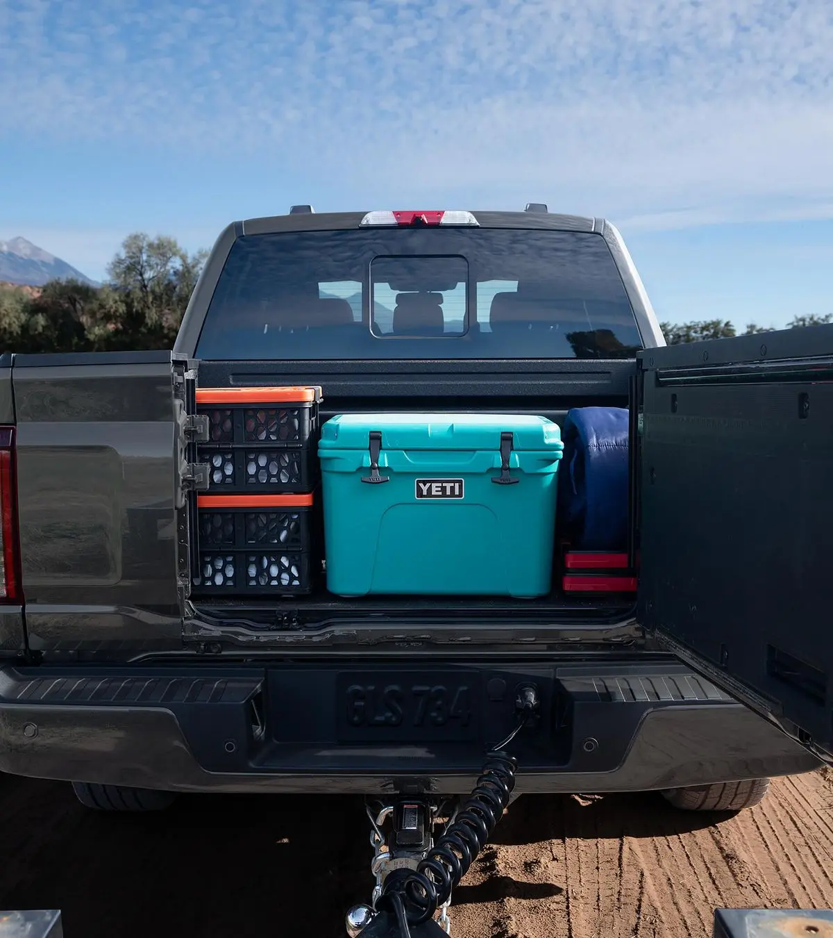 Close-up of the Pro Access Tailgate on a 2026 Ford F-150 truck bed with tools and equipment shown