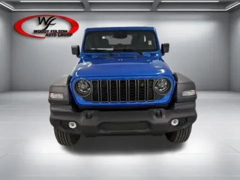 Photos of 2026 Jeep Wrangler Sport S for sale in Baxley, GA at Woody Folsom CDJR of Baxley