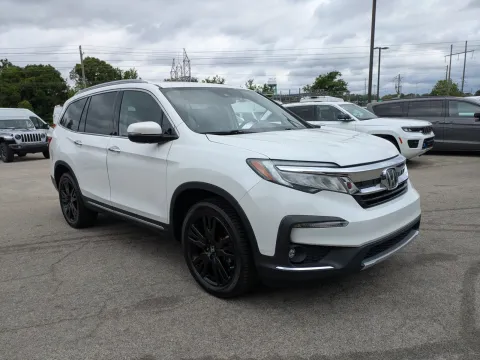 Photos of 2021 Honda Pilot Touring 7-Passenger for sale in Vidalia, GA at Woody Folsom CDJR of Vidalia