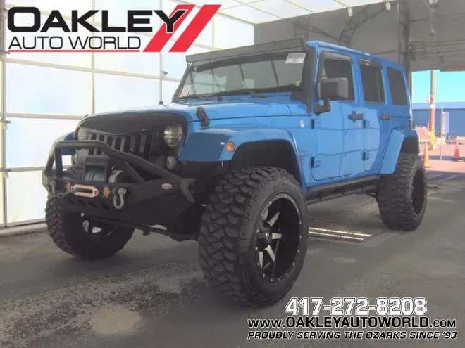 Blue 2015 Jeep Wrangler Unlimited Sahara for sale in Branson West, MO