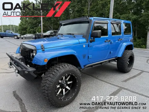 Blue 2015 Jeep Wrangler Unlimited Sahara for sale in Branson West, MO