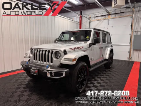 Silver 2023 Jeep Wrangler Sahara 4xe for sale in Branson West, MO